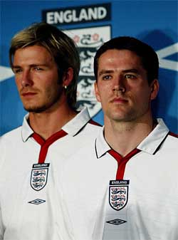 David Beckham and Michael Owen sport the new England team kit 