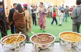 Guests enjoy a vegetarian feast prepared by Gobind Caterers at a function in Mani Majra