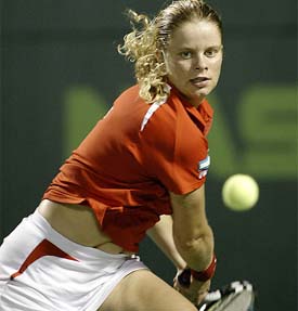 Jelena Dokic of Yugoslavia and Kim Clijsters of Belgium in action during the Nasdaq-100 Open