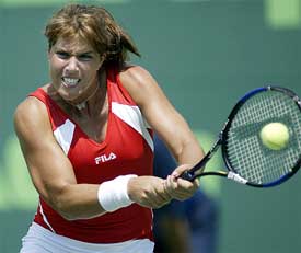 Jennifer Capriati of the USA hits a forehand smash
