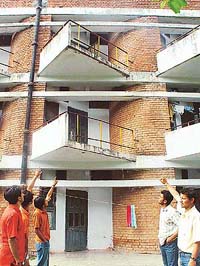 Students show the balcony of a room on the second floor of Boys Hostel No. 5 at Panjab University from where Manjot, an MA-II (Punjabi) student, fell off. 