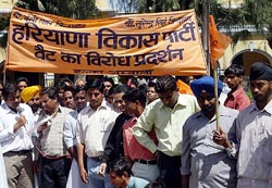 HVP activists hold a demonstration against VAT