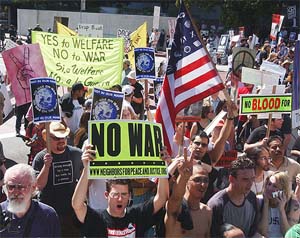 Thousands of anti-war protestors rally in opposition to the US-led invasion