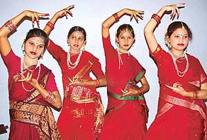 Girls present a folk dance during the Orissa Day celebrations organised by the Utkal Sanskrutik Sangh at Lord Jagannath temple in Sector 31, Chandigarh
