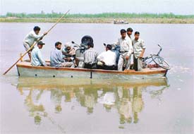 Small boats have been deployed to ferry passengers across the Sutlej