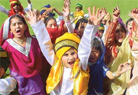 Students of Bharatiya Vidya Mandir perform a dance to mark the beginning of 