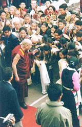 The Tibetan spiritual leader Dalai Lama blesses the devotees