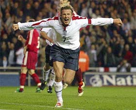 England captain David Beckham celebrates after scoring against Turkey