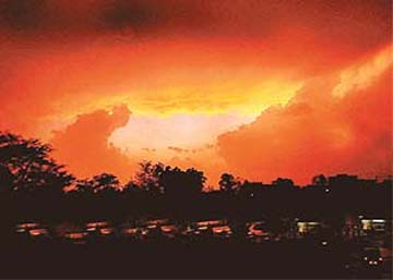 As the weather gods decided to send rain to the city, the sky was suddenly overcast with hues of fire