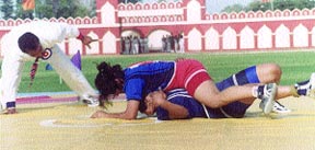Jyoti pins down Pooja in the Delhi State Wrestling Championship at the BSF Campus 