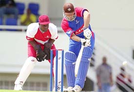 Adam Hollioake of England bats against the West Indies