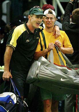 Australia's Lleyton Hewitt is congratulated by Australian Davis Cup Captain John Fitzgerald