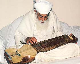 Satguru Jagjit Singh playing the rabab