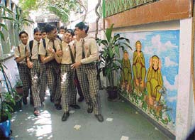 Students of Gupta Model Hidh School coming out