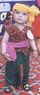 A child dressed up for the Baby Show at Kidstown