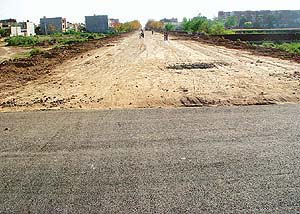 The kutcha road between Phases X and XI remains incomplete even as the Chandigarh Administration opened its section of this road 