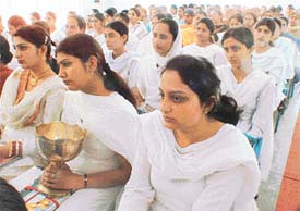 With hopes in eyes, young students listen intently to the proceedings during the annual prize distribution function