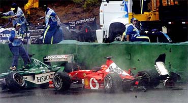 The Ferrari driven by Michael Schumacher crashes into Antonio Pizzonia's Jaguar