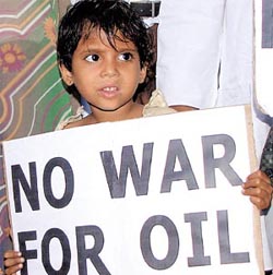 A child protests against US action in Iraq in the Capital