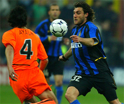 Inter Milan's Christian Vieri is challenged by Fabian Ayala of Valencia 