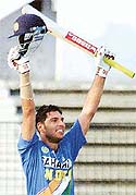 Yuvraj Singh of India greets spectators as he hits his maiden unbeaten century