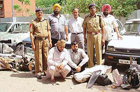 Two members of a gang involved in automobile thefts, Kulwinder and Rinku (sitting), who were arrested by the operation cell of Chandigarh Police on Saturday