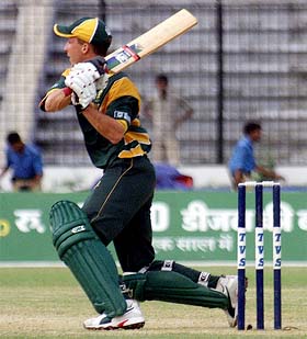 South Africa's Boeta Dippenaar hits a shot off Mohammad Ashraful 