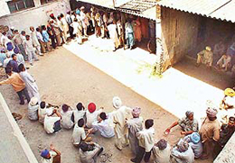 A long queue of people outside a bill collection centre of the Punjab State Electricity Board office in Zirakpur on Wednesday. 