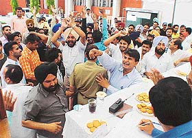 Bidders at an auction of parking lots in the Municipal Corporation office in Sector 17, Chandigarh