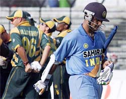 Indian skipper Saurav Ganguly leaves the field after he was caught by Shaun Pollock off Paul Adams