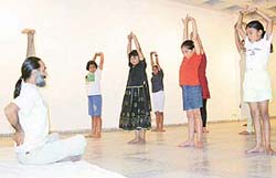 Navtej Singh Johar familiarises participants of the dance workshop with basic postures of bharatnatyam at Punjab Kala Bhavan