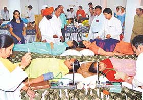 Volunteers donate blood at a camp held at Sant Nirankari Bhavan in Sector 30 in Chandigarh