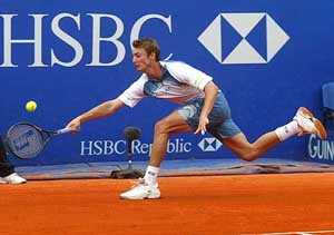 Juan Carlos Ferrero of Spain makes a forehand return against Vincent Spadea of the US during their semifinal match 