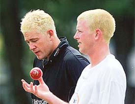 New Zealand bowlers Ian Butler and Daryl Tuffey prepare for a practice session 