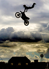 Freestyle Motorcross rider Peter McCann performs an aerial stunt 