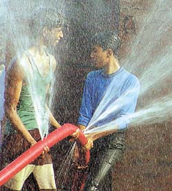 Youngsters enjoy the gushing water unmindful of the impending water crisis in the Capital on Thursday.