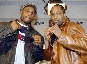 World heavyweight champion Lennox Lewis of England and Canadian challenger Kirk Johnson pose for photographers 