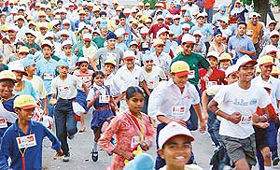 Children from different schools participate in a �run-for-peace� organised by The Tribune Group at the Rock Garden in Chandigarh on Sunday. 