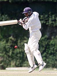 Sri Lankan captain Hashan Tillakaratne hits a boundary during the third day of the first Test between Sri Lanka and New Zealand in Colombo