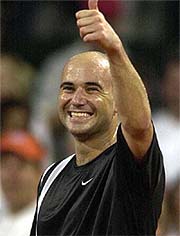 Andre Agassi gives a thumbs-up after beating Jurgen Melzer of Austria 6-4, 6-1 in the semifinals of the US Men's Clay Court championship