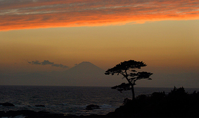 Mount Fuji, Japan's highest peak at 3,776 metres, looms in the evening glow in Yokosuka
