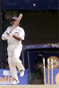 Sri Lankan captain Hashan Tillakaratne is bowled by  Shane Bond of New Zealand