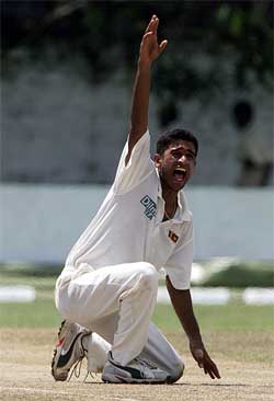 Sri Lankan bowler Kaushal Lokuararchchi makes a successful lbw appeal against New Zealand batsman Matthew Horne