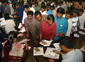 Indian officials collect applications for travel papers