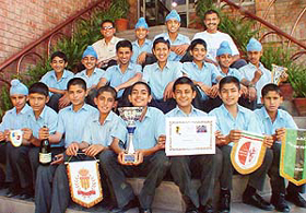 The St Stephen Football Academy team members are all smiles as they pose for a photograph after returning from Italy.