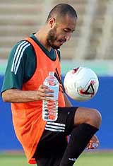 Libyan Football Federation vice-president and national team�s captain Al-Saadi Gadhafi, son of Libyan leader Muammar Gadhafi, controls a ball during a training session with his national team in Tripoli on Tuesday. 