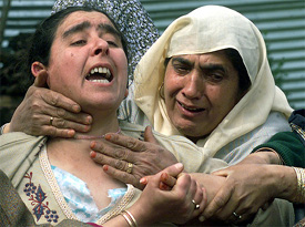 The mother of Javid Ahmad wails 