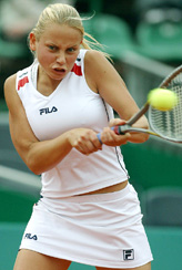 Jelena Dokic plays a backhand return