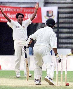 Mohammad Rafique of Bangladesh celebrates after bowling South Africa's Paul Adams
