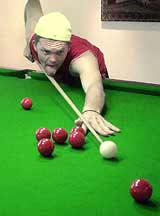 New Zealand's Lou Vincent plays billiards in Kandy, Sri Lanka